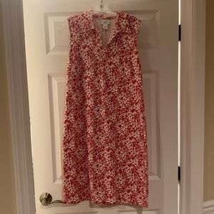 Red and white flowered dress.